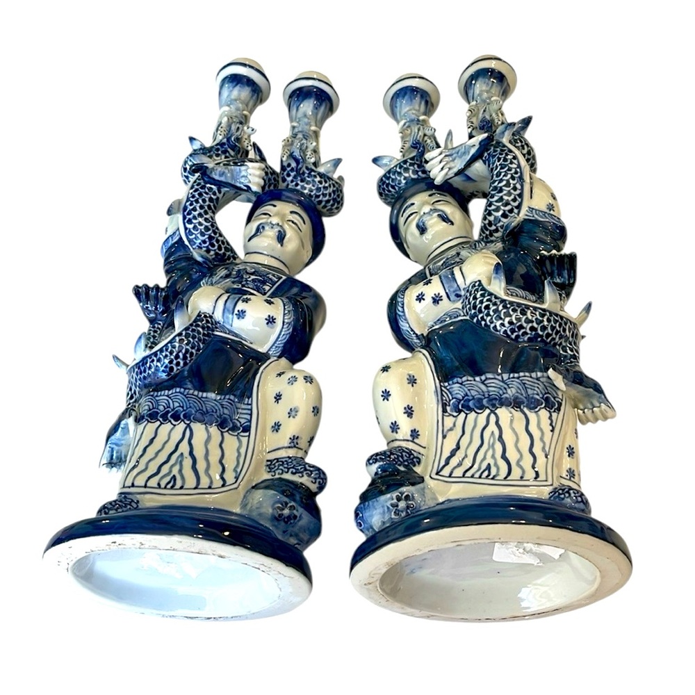Blue and White Ceramic  Fishing Figurines with Intricate Detailing